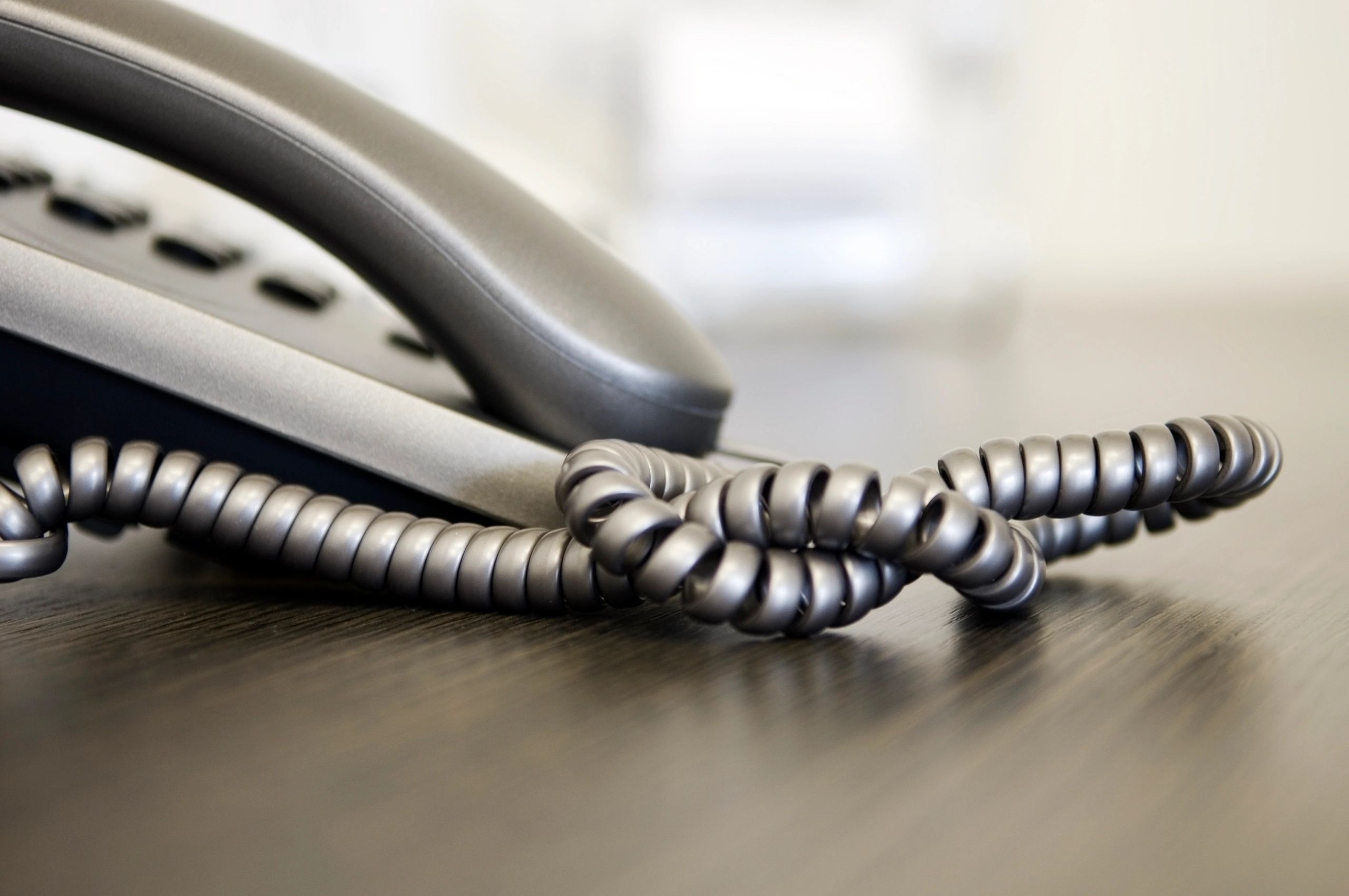 Office desk phone on a modern desk