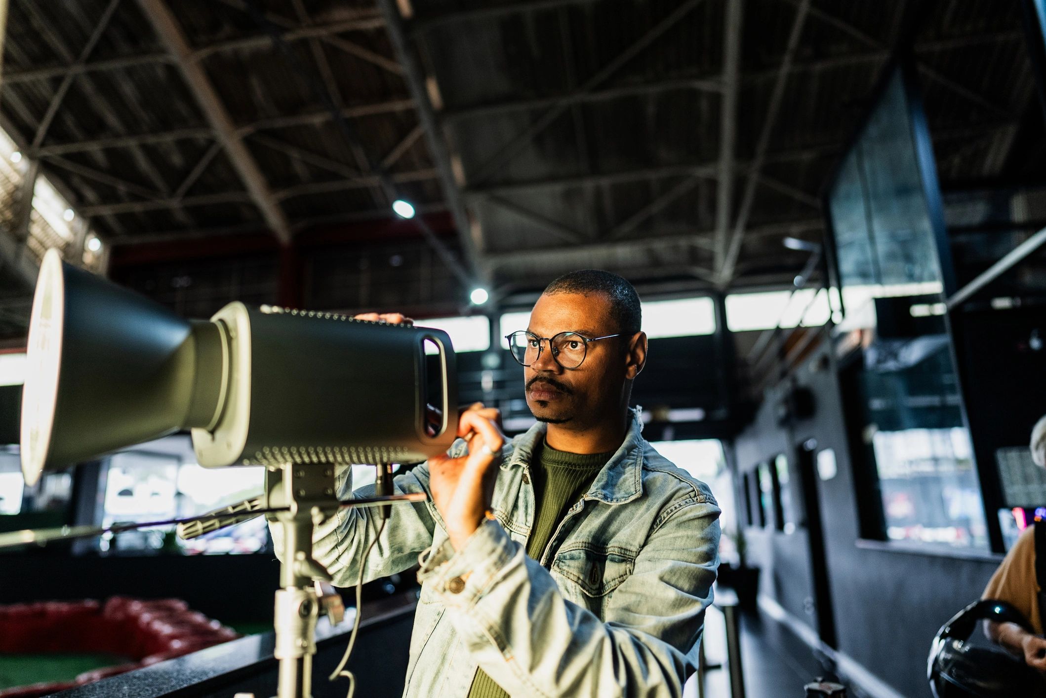 Technician performing maintenance on network equipment