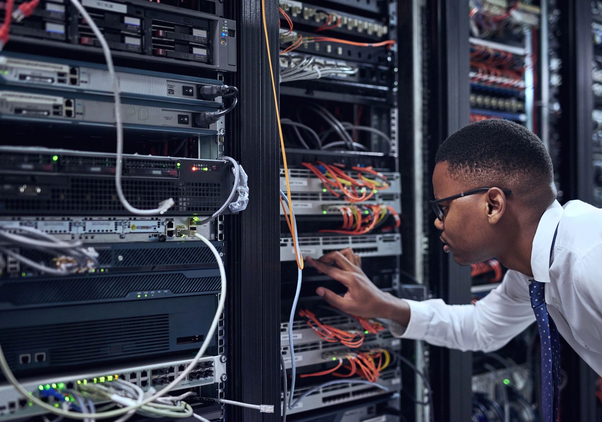 IT technician working in a server room